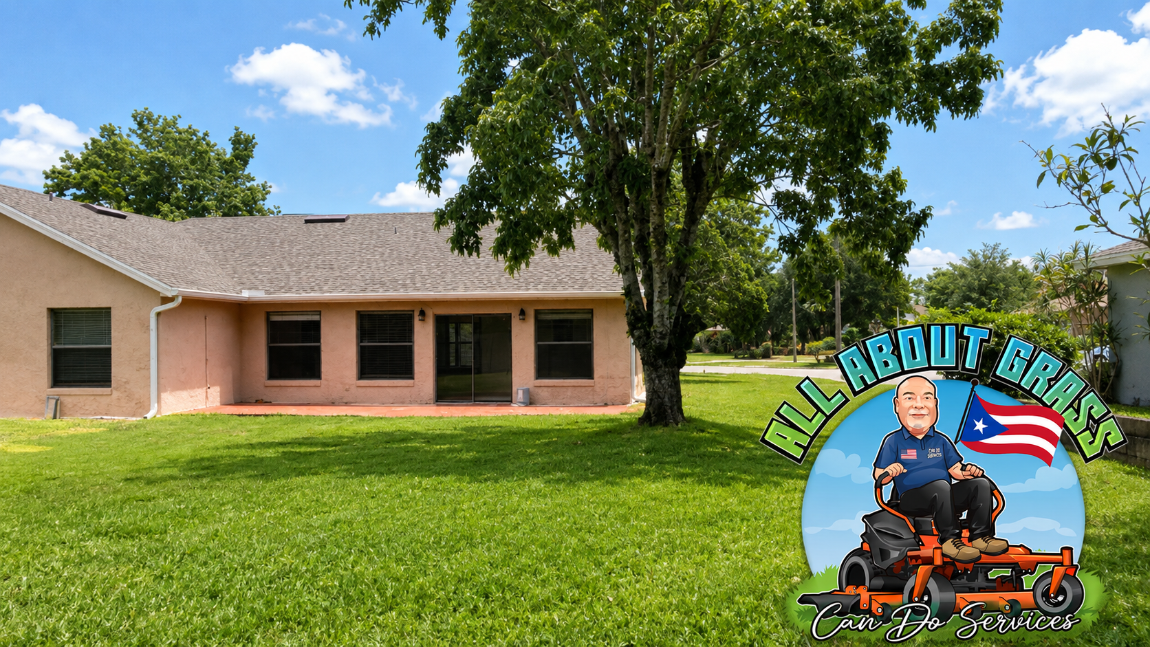 Freshly mowed lawn in front of a home with All About Grass branding.